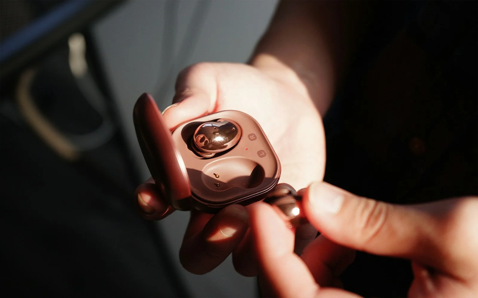 person holding black and gray device