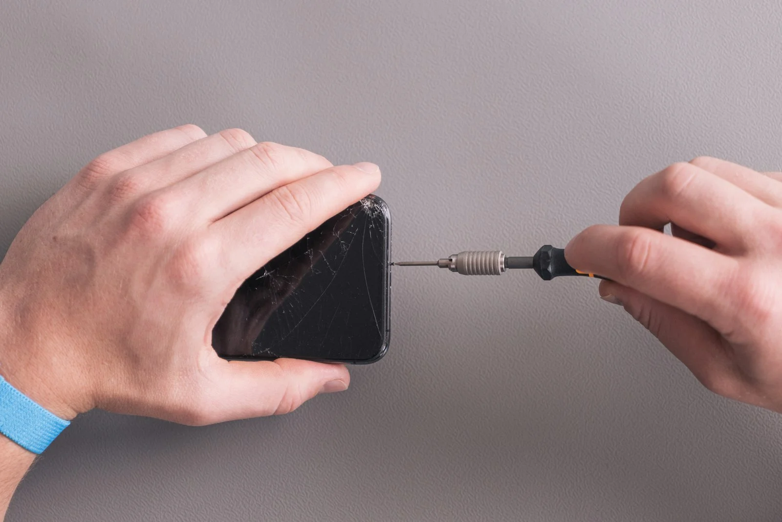 a person holding a black object